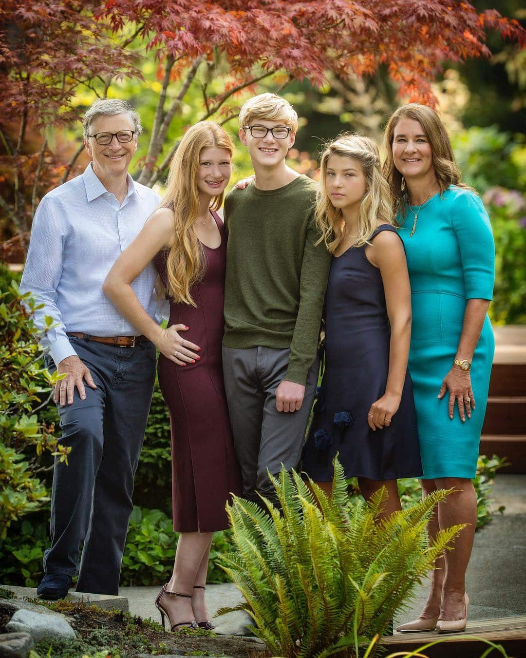 Bill Gates standing proud with his former wife and his three children.